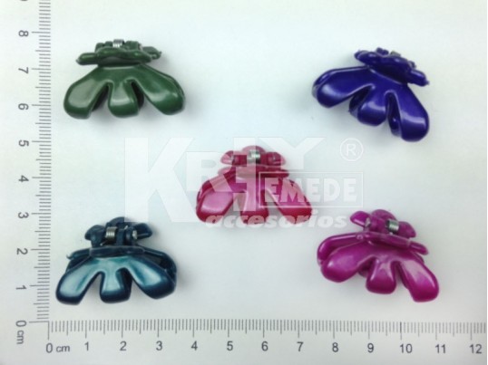 Broche flor irregular paq. x 12